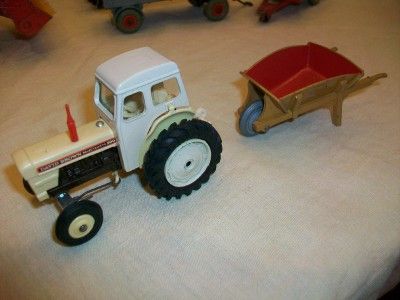 This auction is for a 1960s Corgi Dinky Toys Farm Lot Tractors Wagons 